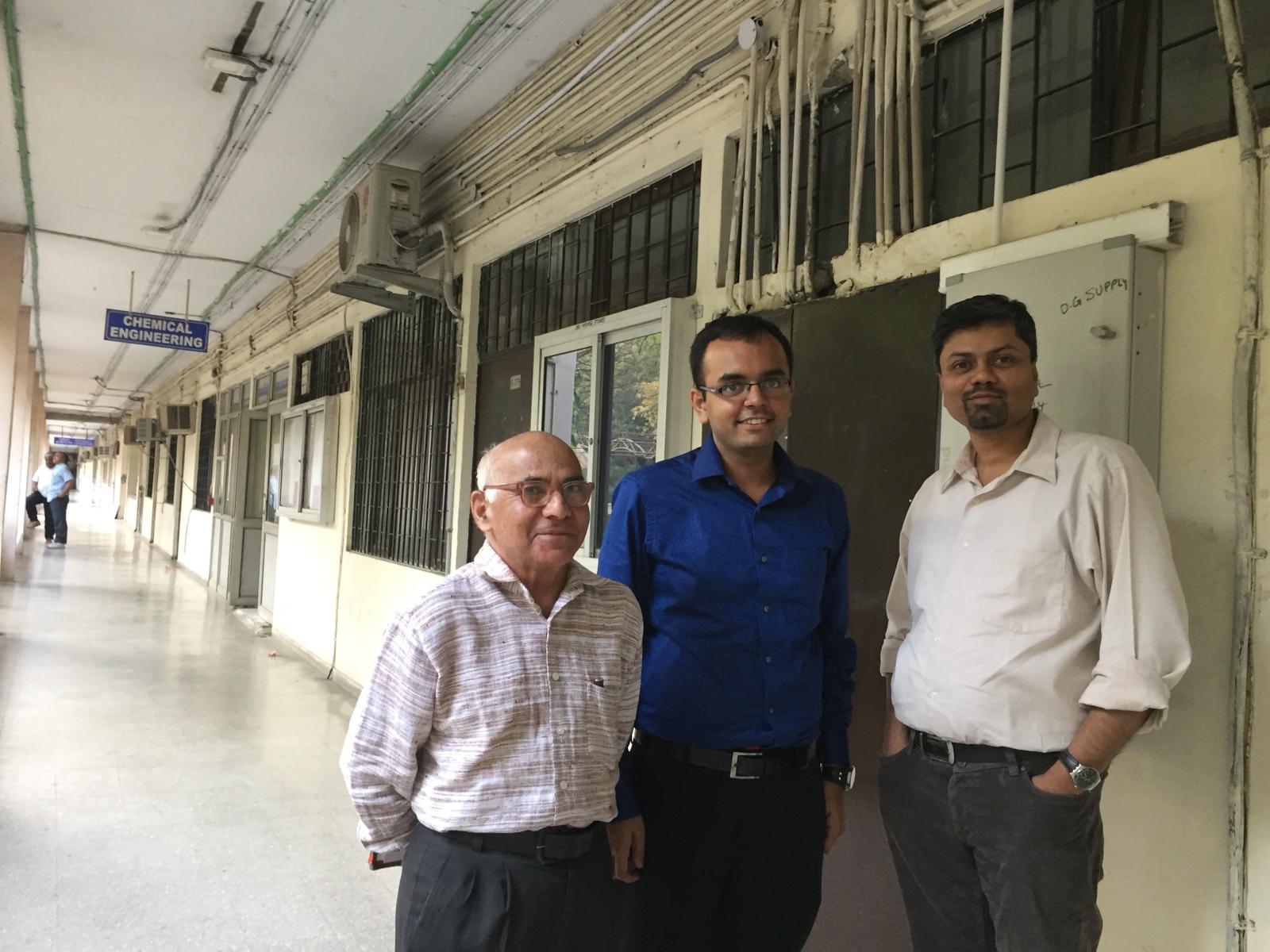 Prof. Gupta in the Chemical Engineering corridor at IIT Delhi with Prof. Shantanu Roy and another colleague.