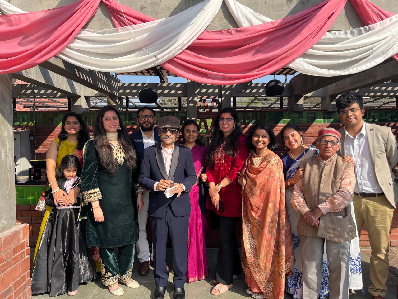 A group of friends, students and Prof. Gupta at a wedding reception on the IIT Delhi campus.