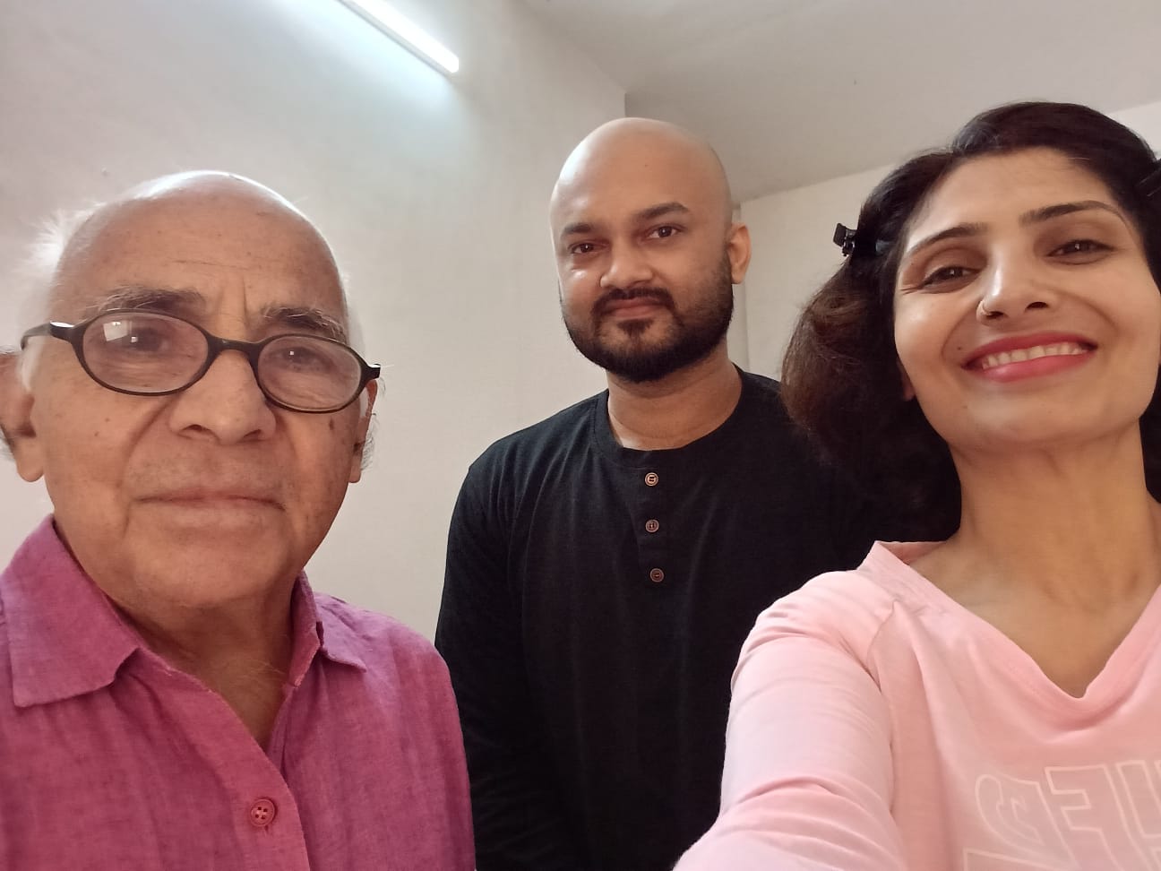 A family selfie with Prof. Gupta at home.